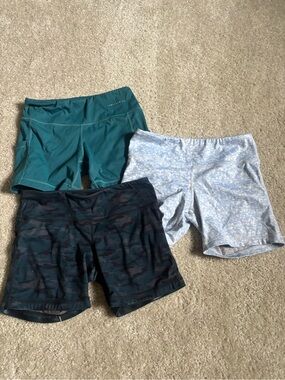 Women’s Athletic Shorts Trio — Teal, Light Blue Floral, and Black Camo